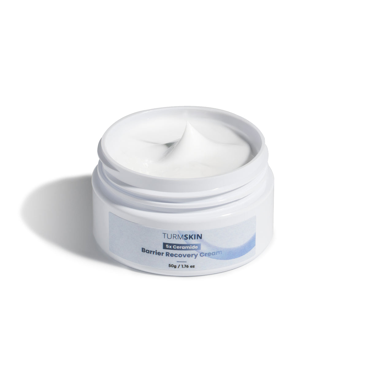 Open jar of TurmSkin Barrier Recovery Cream showing its texture
