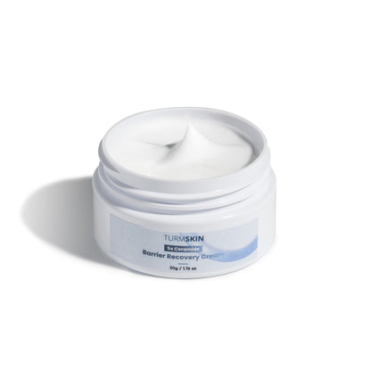 Open jar of TurmSkin Barrier Recovery Cream showing its texture